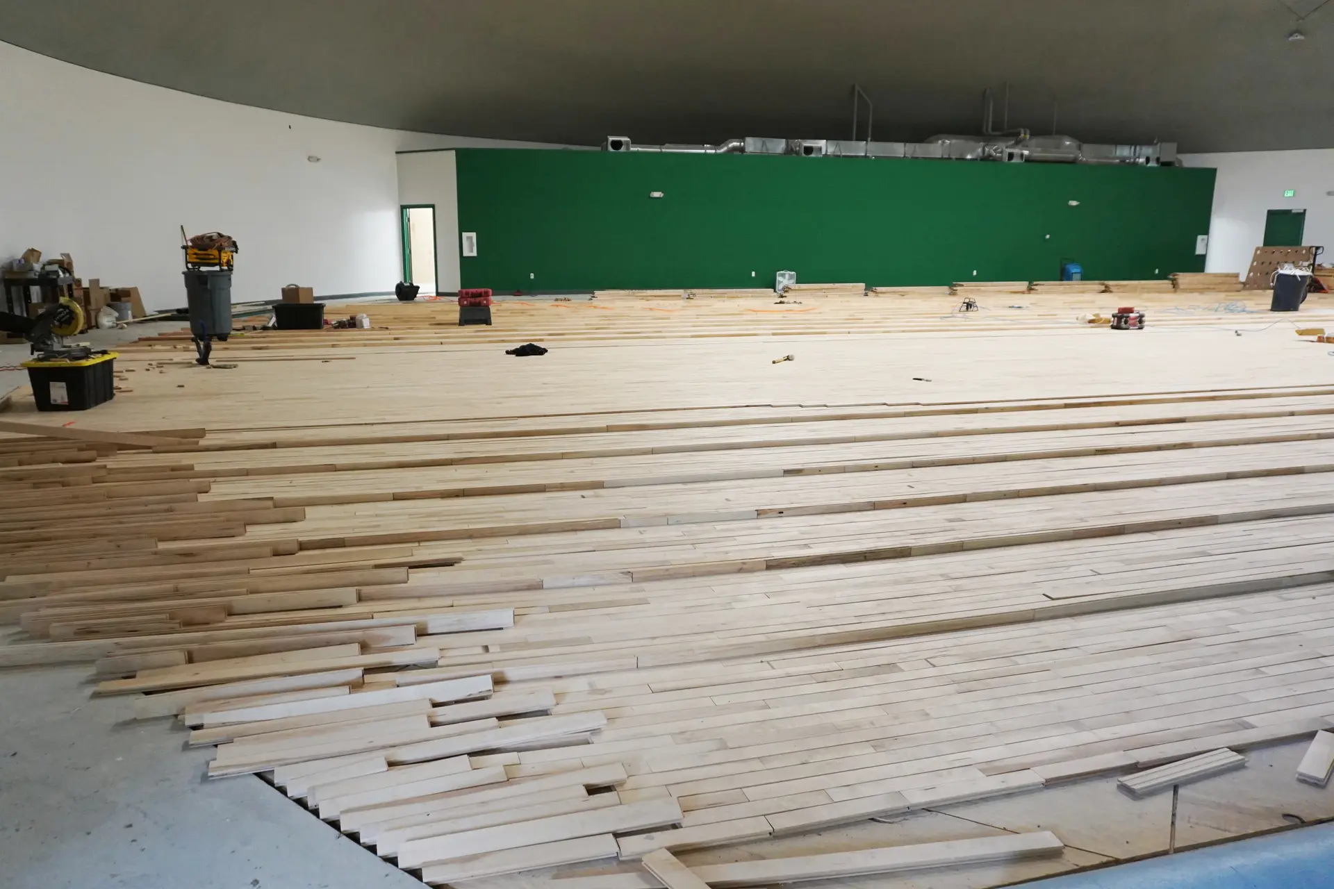 Basketball court floor under construction.