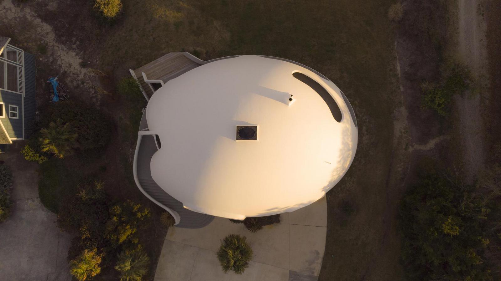 Elliptical dome shape.
