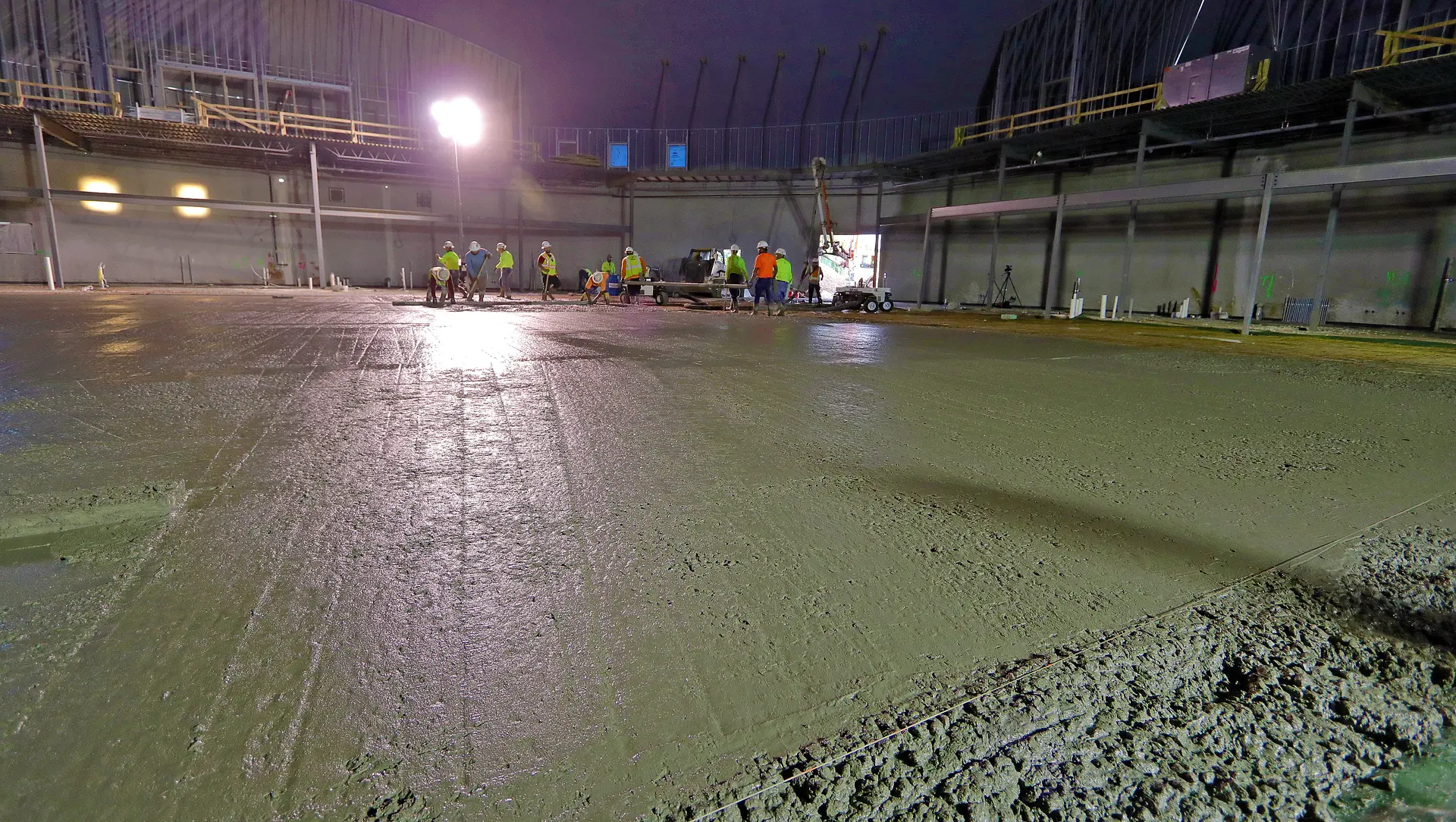 Pouring the concrete floor.