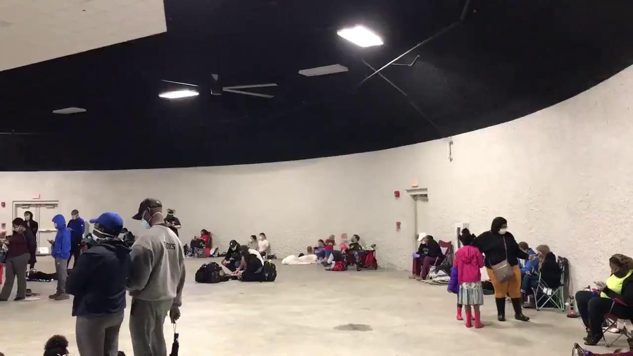 Residents in dome safe room.