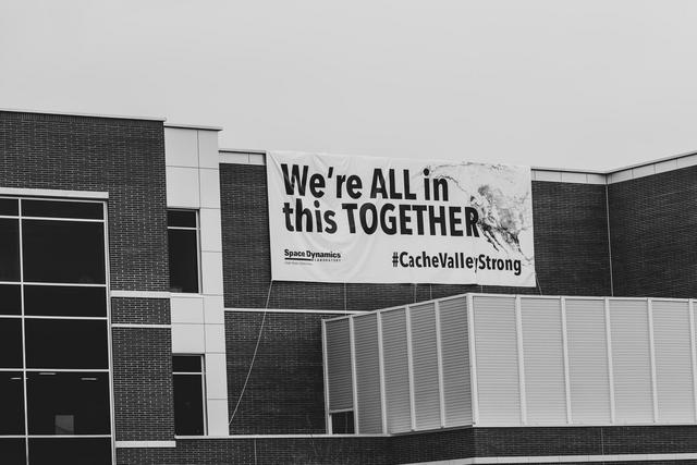 Giant sign that "We're all in this together."