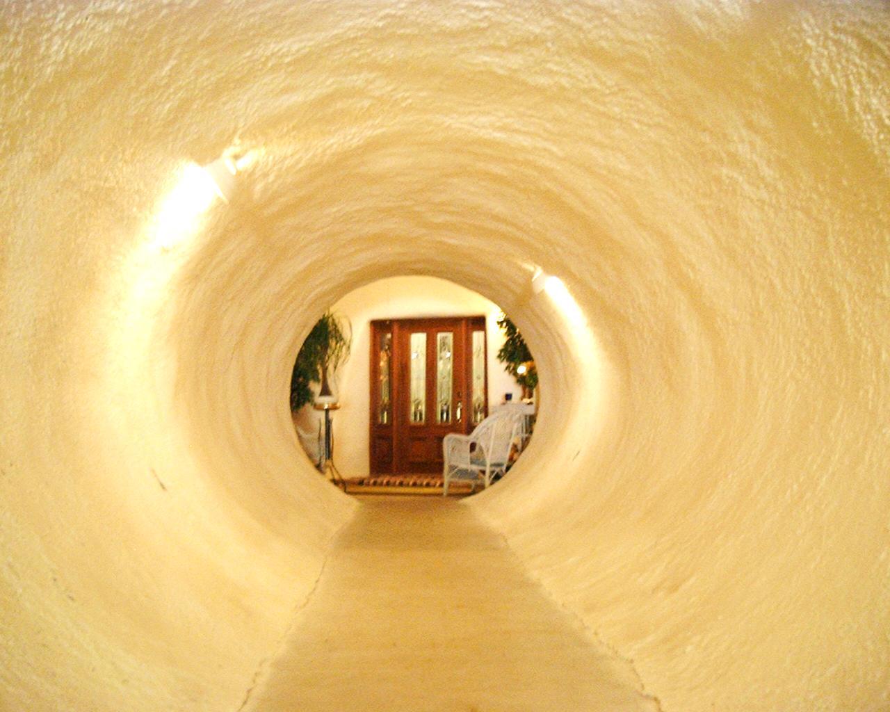 The invisible underground home entrance tunnel.
