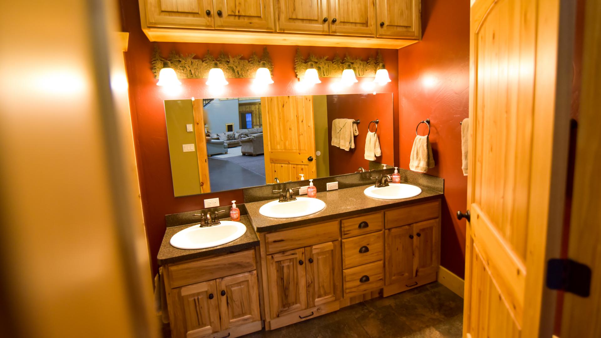 One of two washrooms with adjoining bathrooms.
