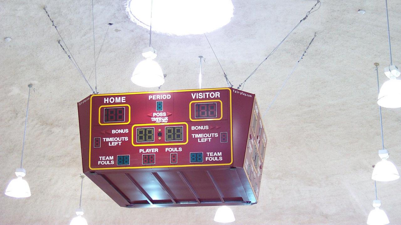 The performance gym scoreboard hangs from the dome.