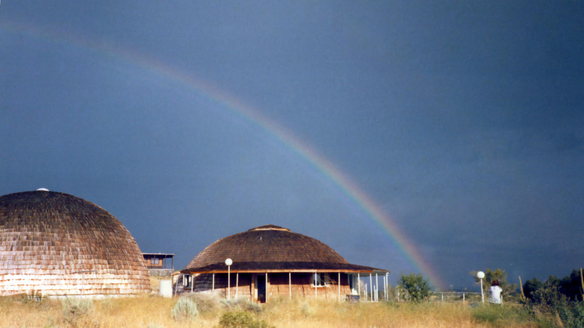 Rainbow over the dome house and garage.