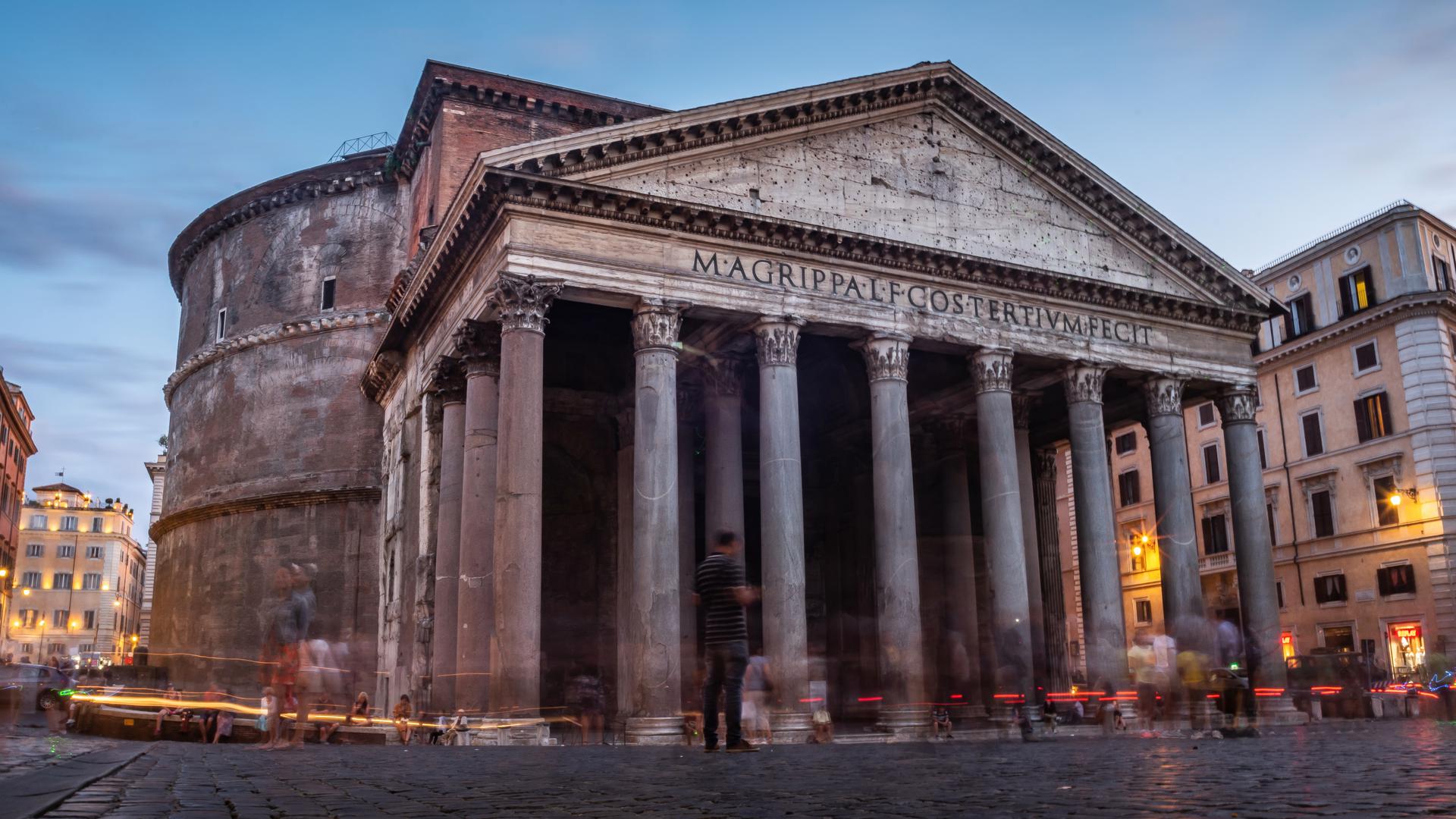 Twilight at the Pantheon as Visitors Walk Around the Enormous Structure.