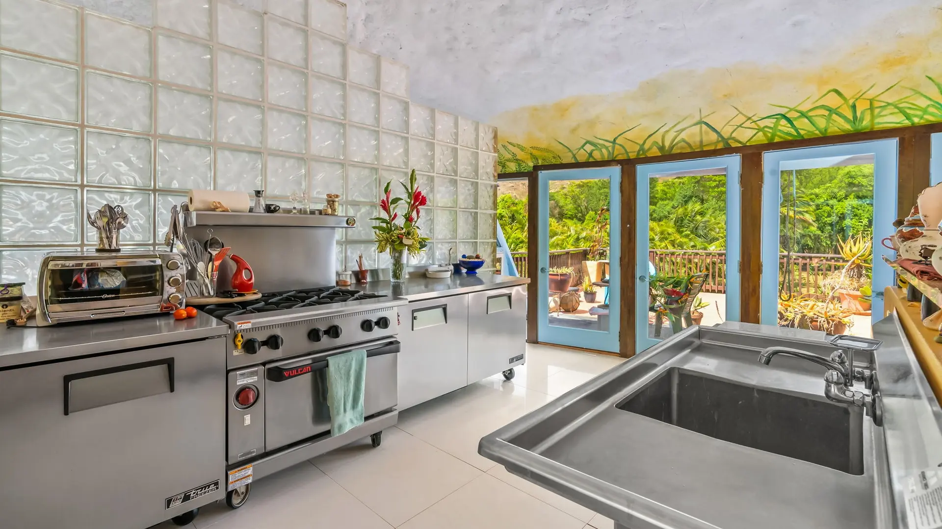 Stainless steel commercial-grade kitchen appliances.