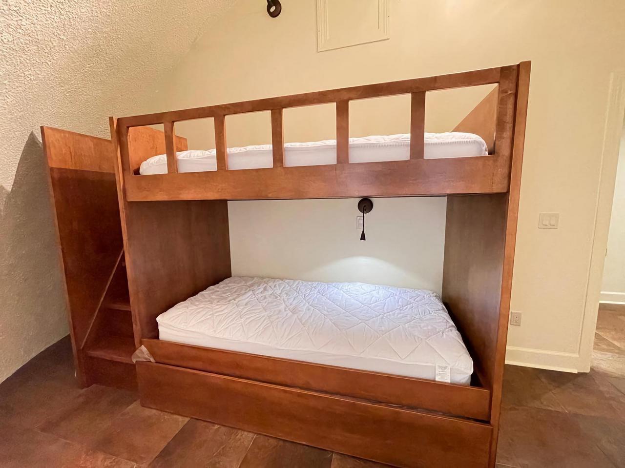Custom maple bunk-bed.