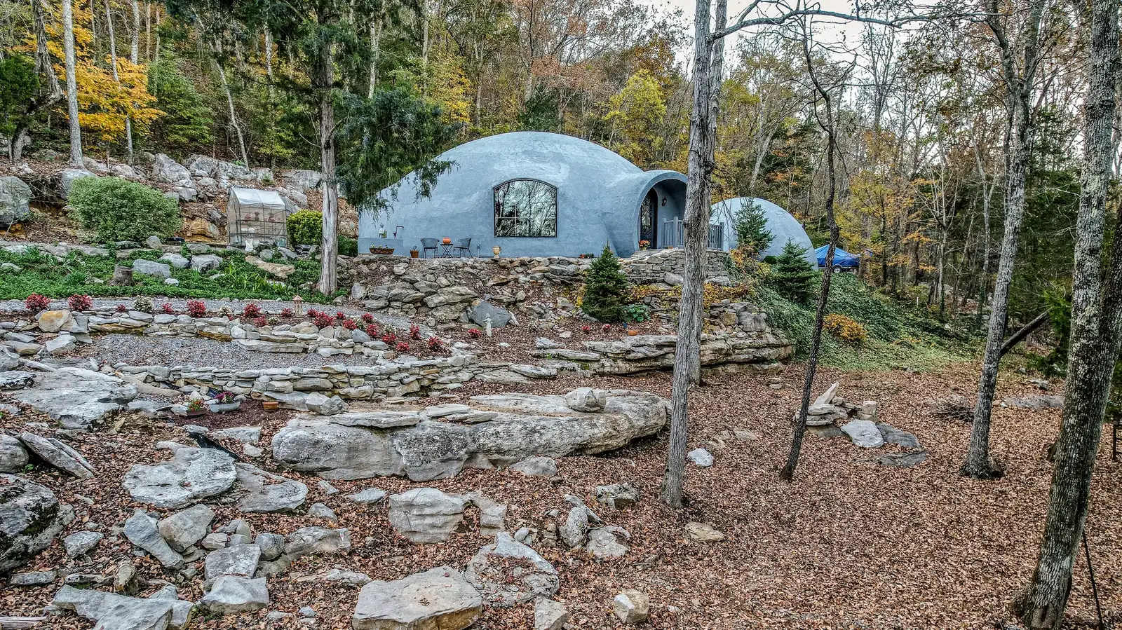 A closer aerial view of the well kept home.