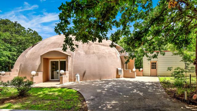 Backyard view of the Monolithic Dome Home.