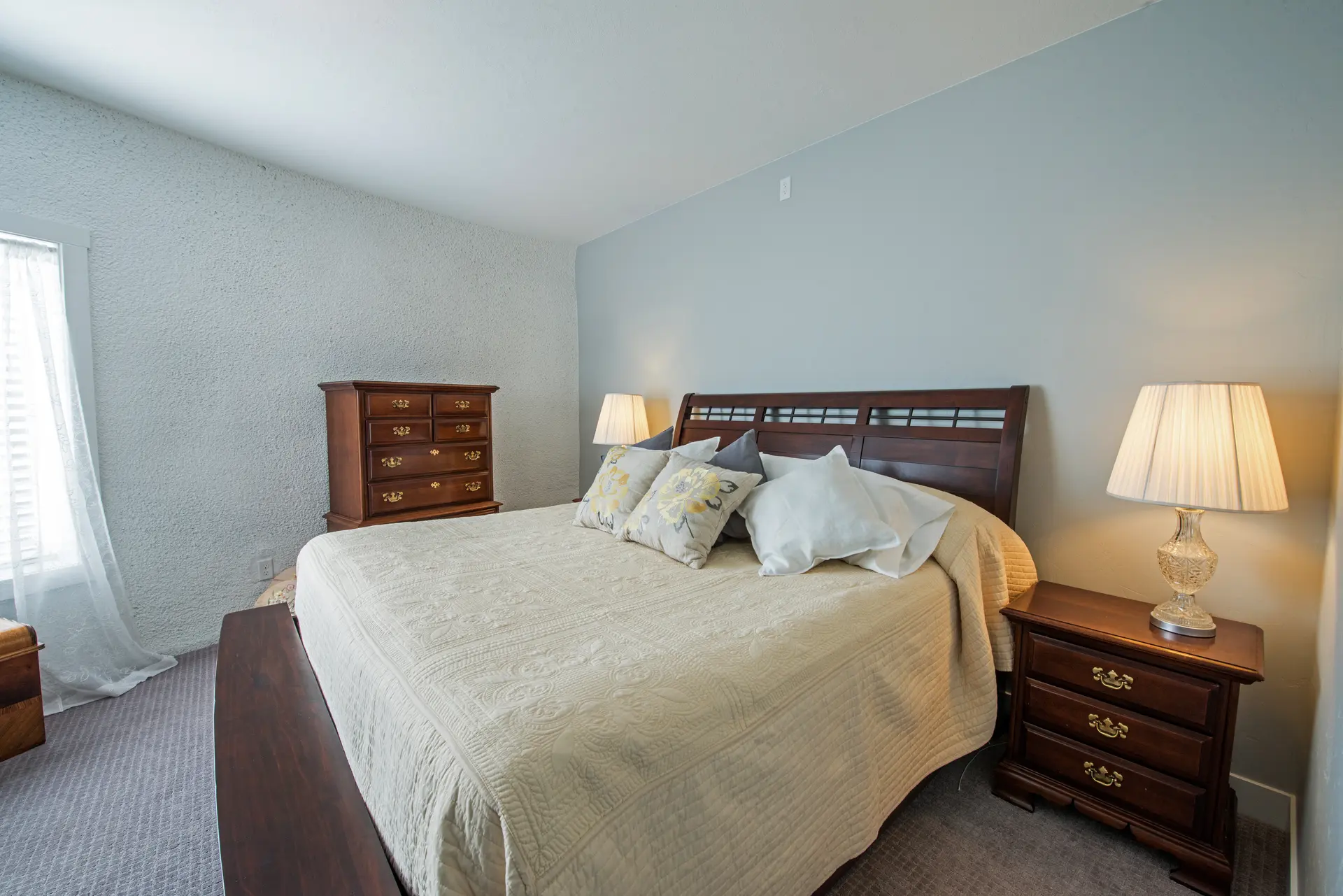 King sized bed in the main bedroom.