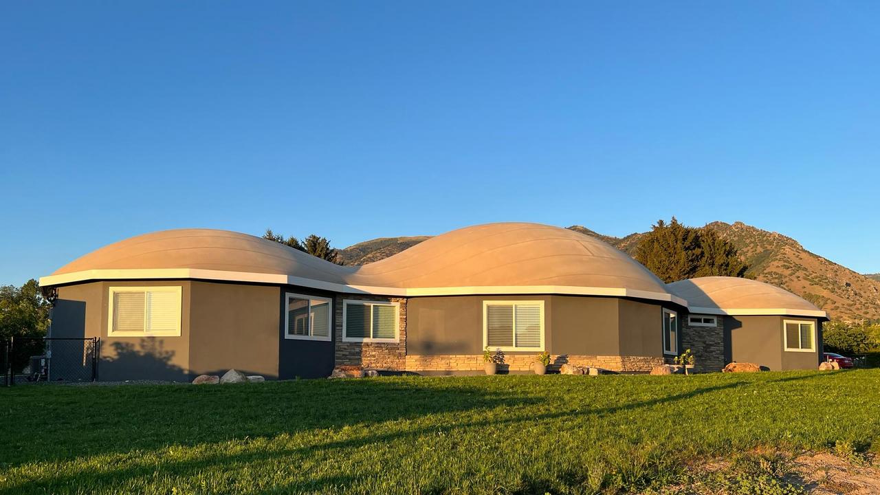 Sunset view of Arcadia Dome Home.