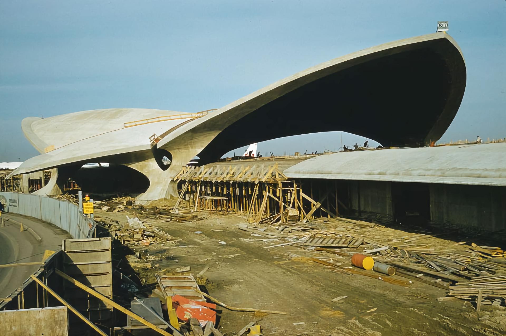 Exterior image of TWA Terminal concrete thin-shell under construction.