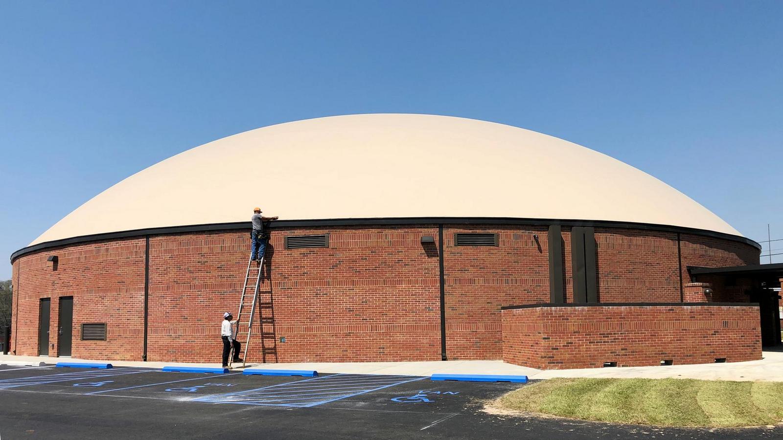 Example of thin-shell concrete dome with veneer wall.