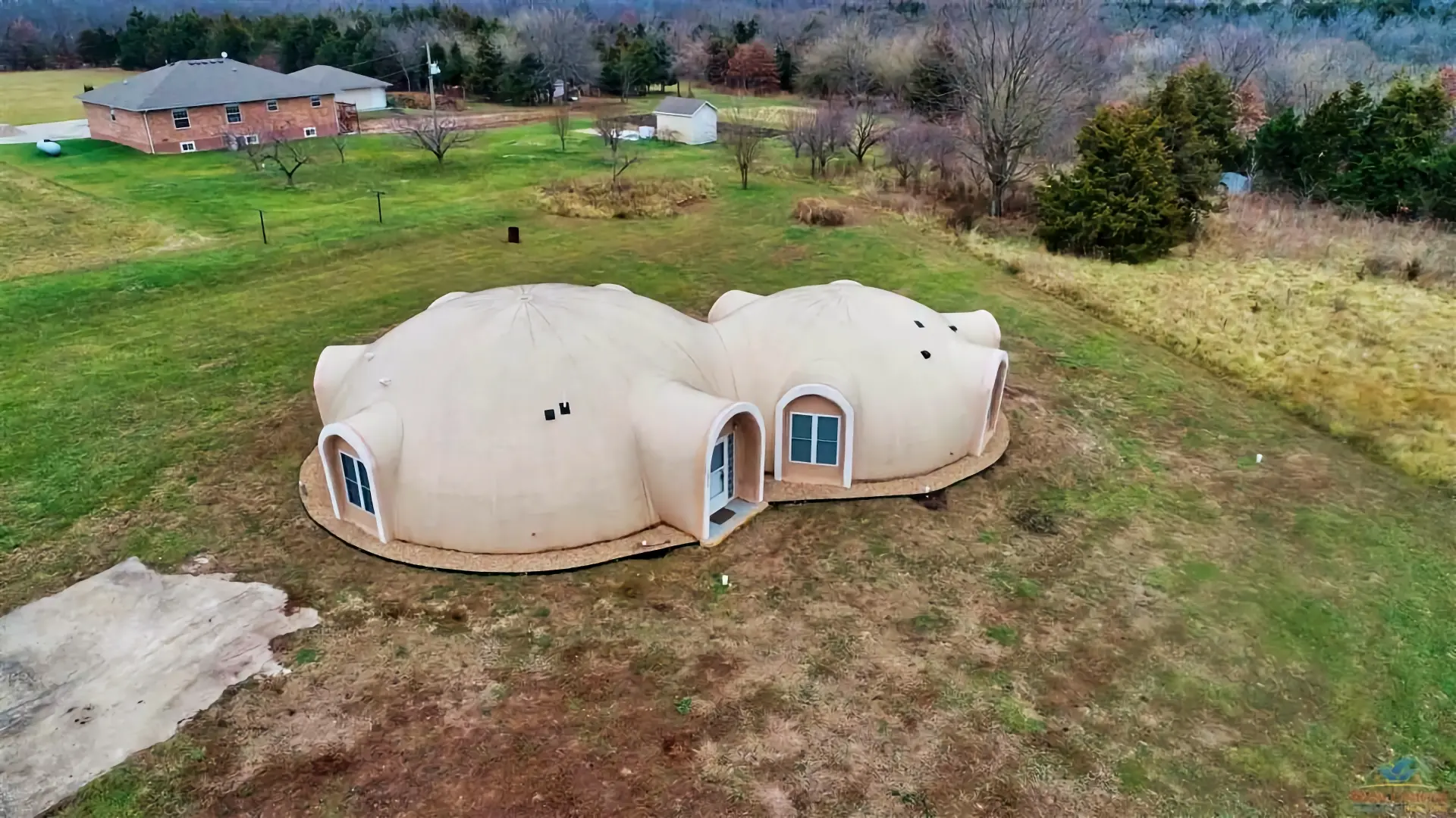 Aerial view of the house on the land.