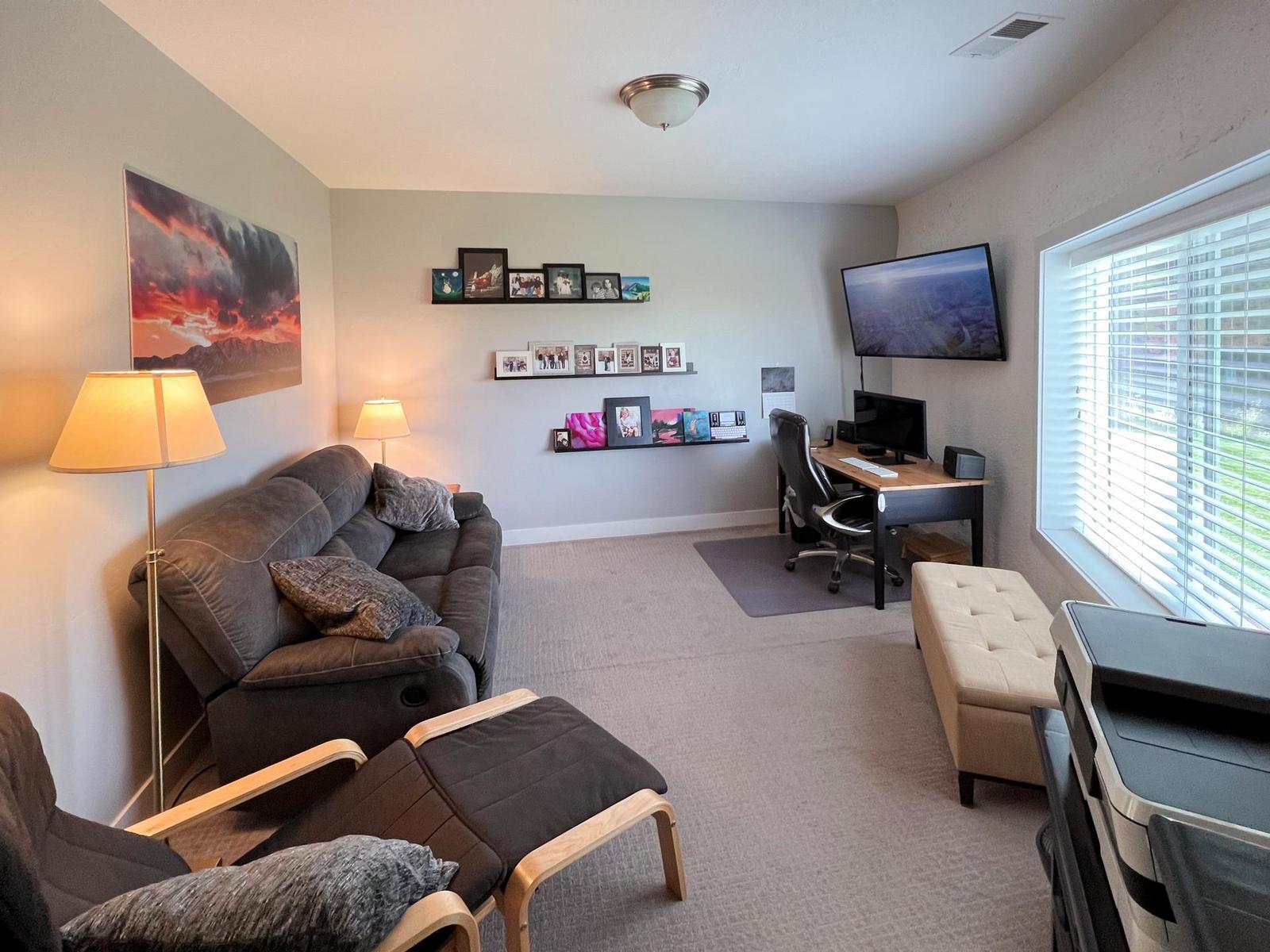 A Big, Comfy Couch Anchors this Versatile Family Room/Office.
