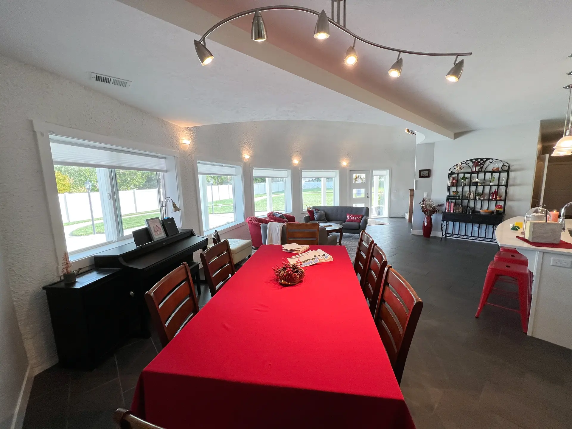 Dining Table and Piano in the Great Room Under the Loft.