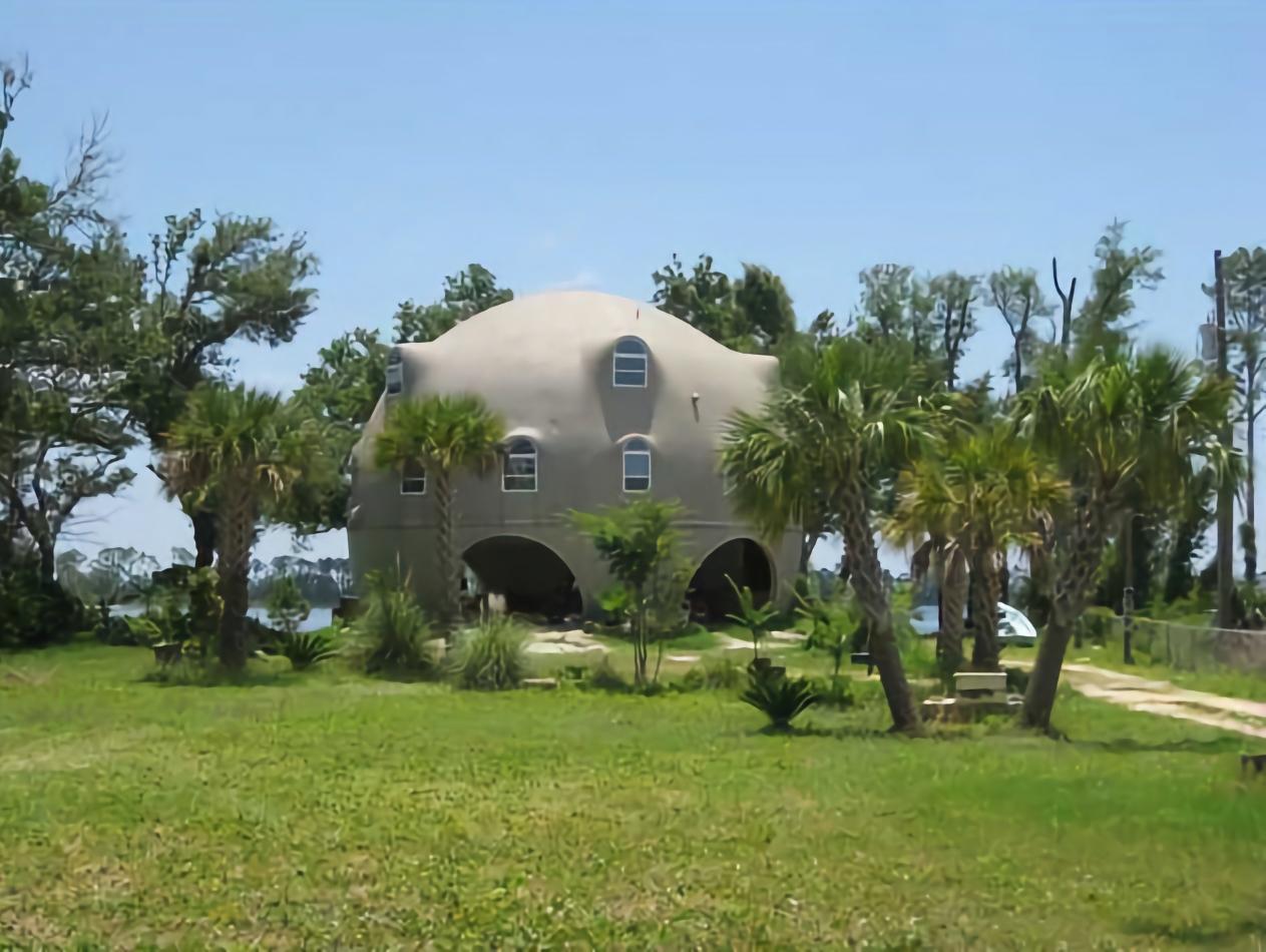 Finished exterior of the dome home on the beach