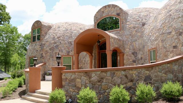 Stone covered Monolithic Dome home.