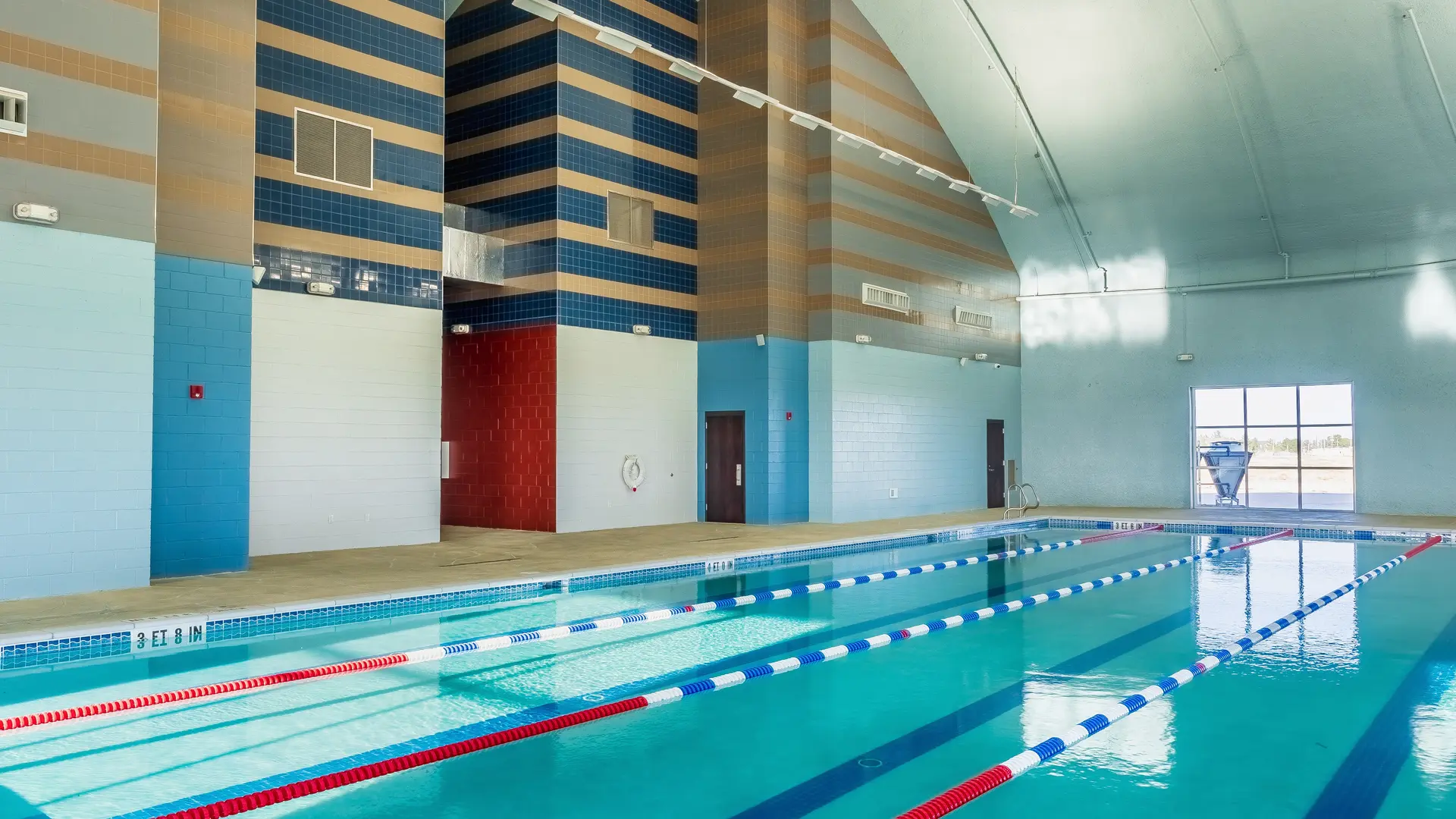 Inside the aquatic center with the 80-foot lap pool.