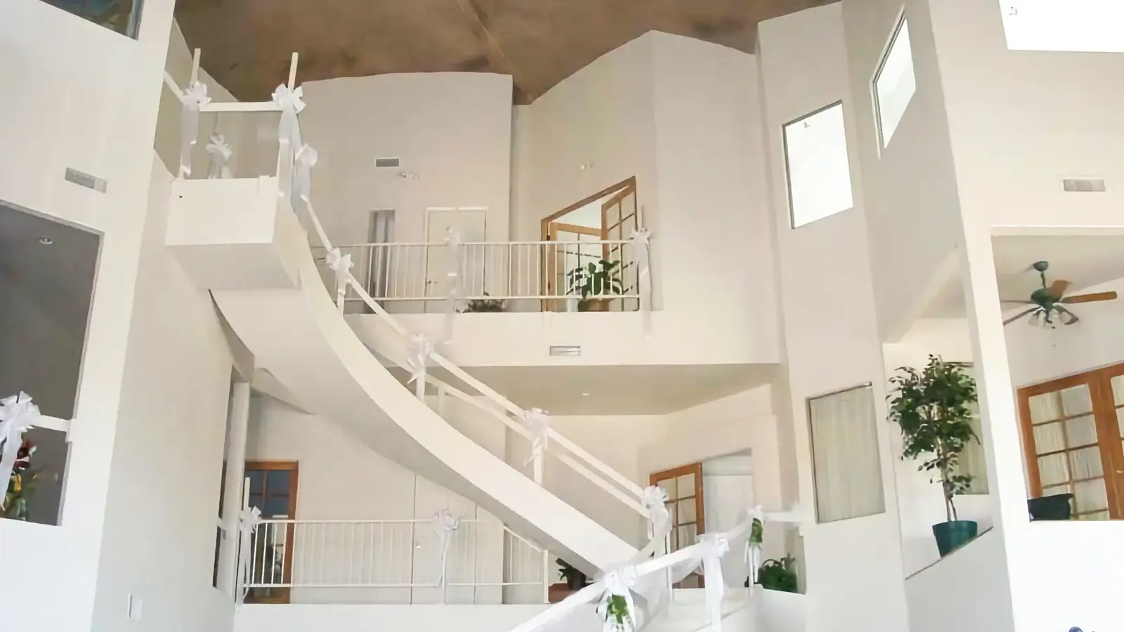 A curving stairway leads to the second and third floors of Yumadome. A curving stairway leads to the second and third floors of Yumadome.