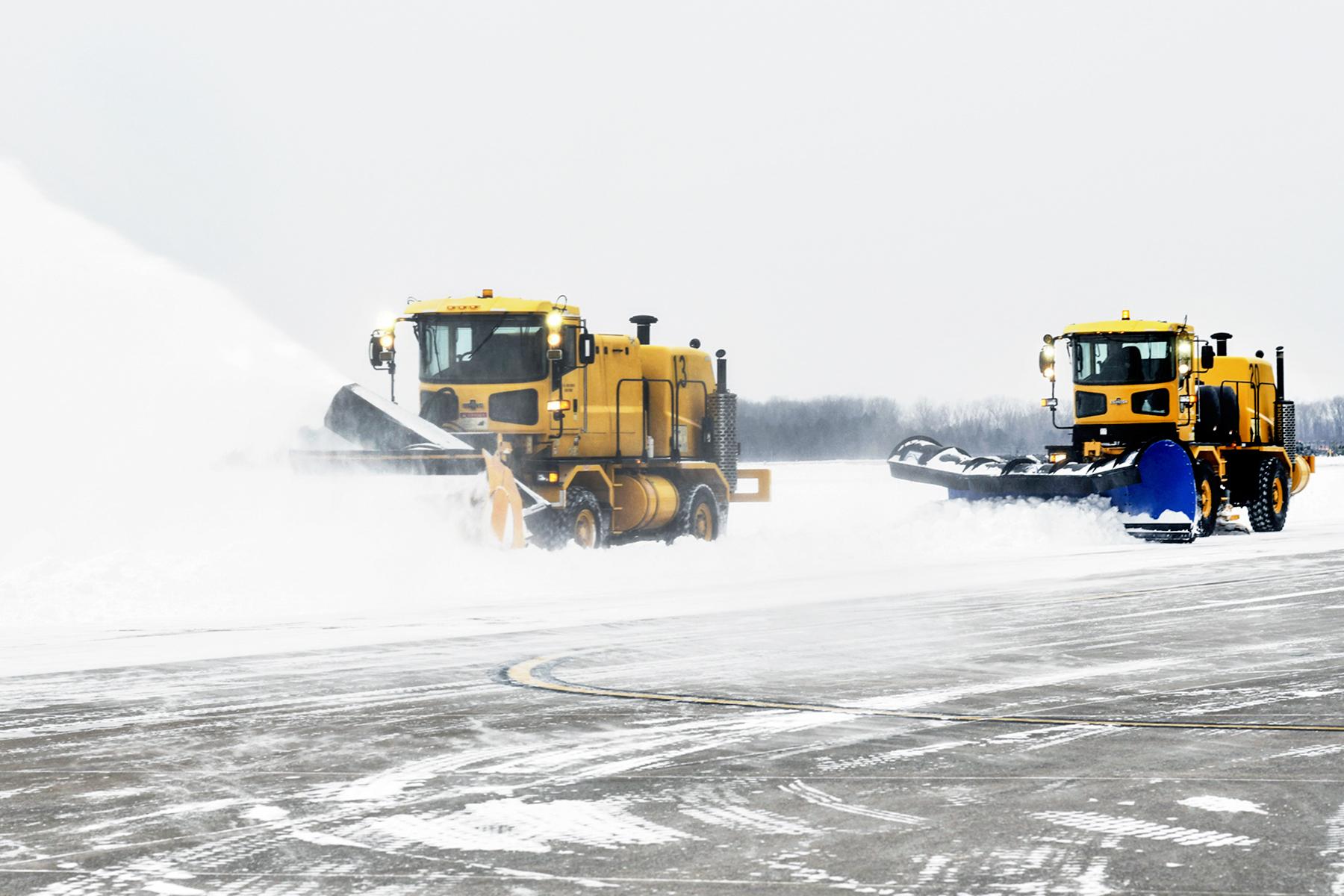 Snowplows Clearing Roads.