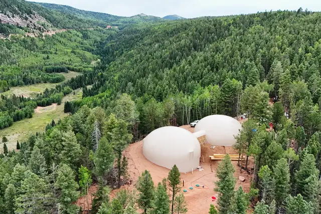 Monolithic Dome Home Surrounded by Trees.
