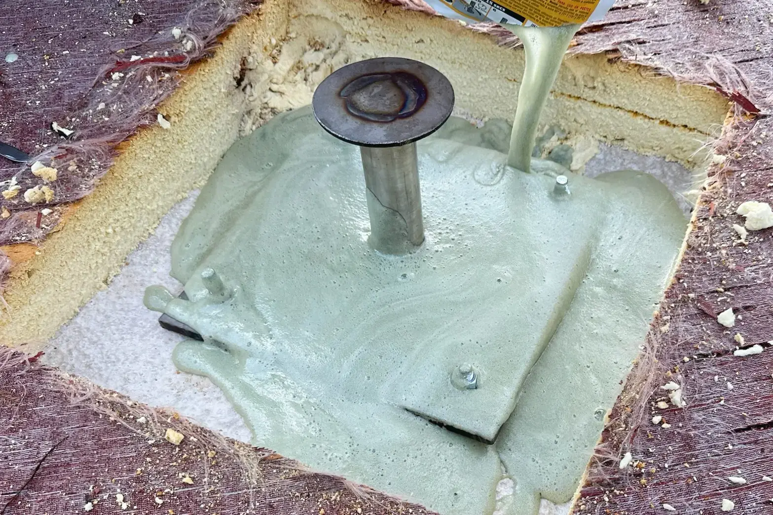 Foam Poured Around Anchor Base.