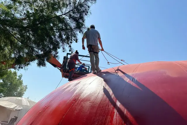South Family Members Atop the Dome in Harnesses.