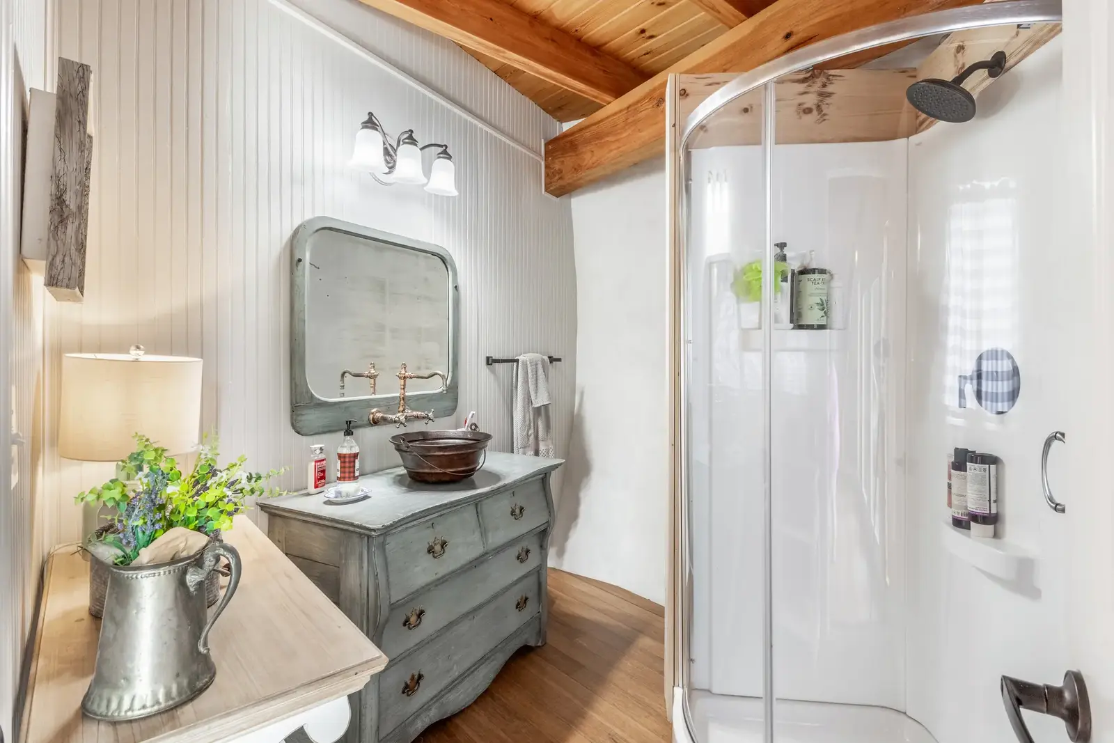 Bathroom With Custom Vanity and Curved Shower Bathroom With Custom Vanity and Curved Shower.