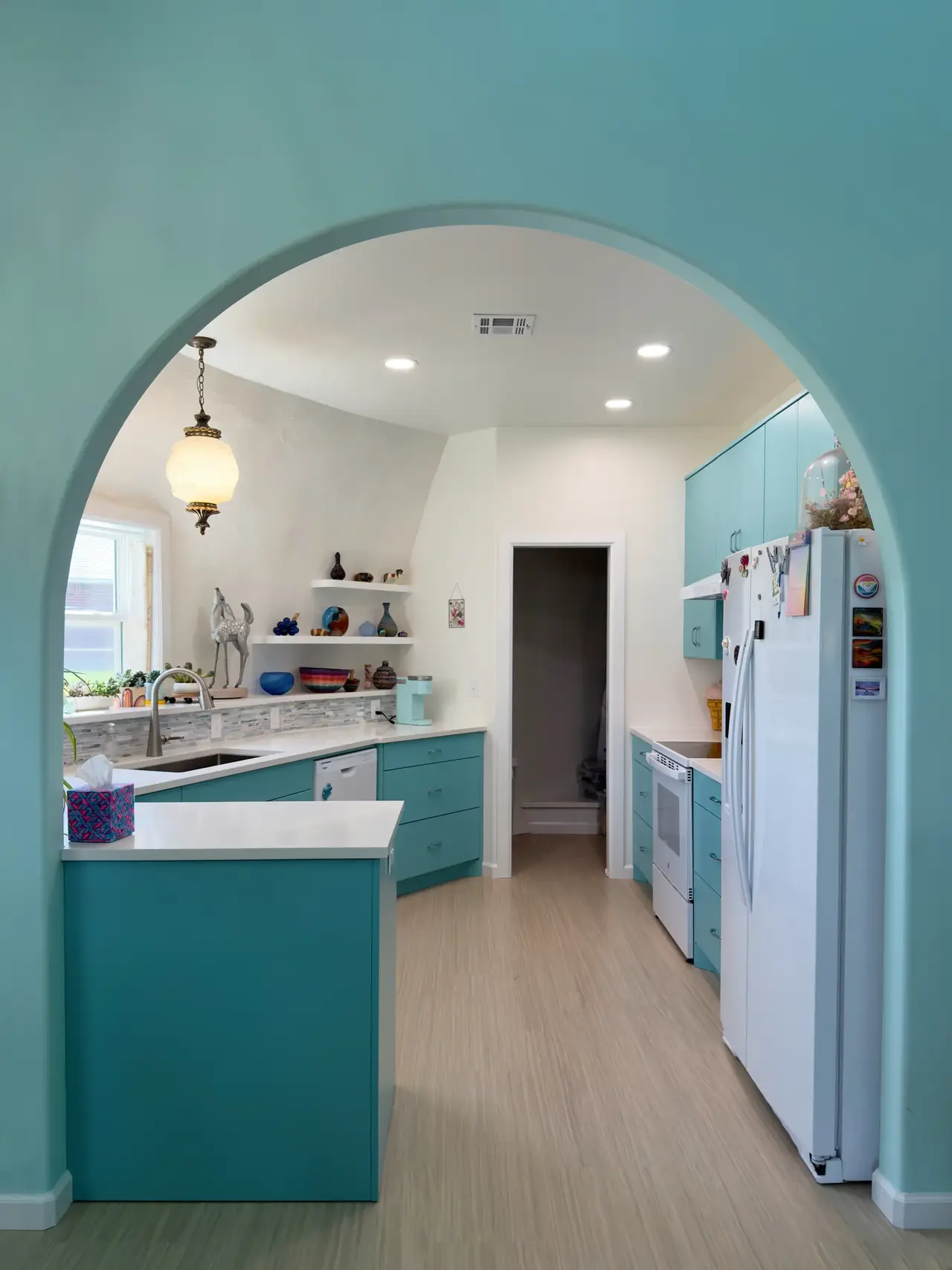 Arched Entryway into Kitchen.