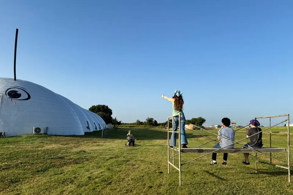 Phoebe Plays the Banjo for Caterpillar-Shaped Monolithic Dome.